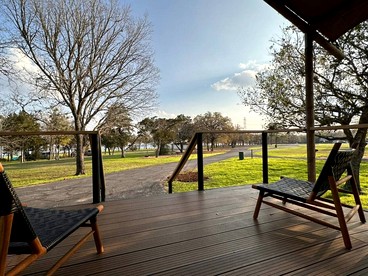 Romantic Lakefront Cabin with Fire Pit near Lake Bastrop, Texas – Luxury Glamping Escape for Couples - Bastrop , Texas - glamping.directory