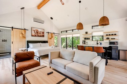 Tranquil Modern Cabin with Friendly Farm Animals & Pond Views Near Cedar Creek, Texas - Cedar Creek, Texas - glamping.directory