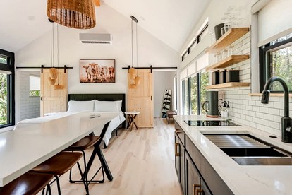Tranquil Modern Cabin with Friendly Farm Animals & Pond Views Near Cedar Creek, Texas - Cedar Creek, Texas - glamping.directory