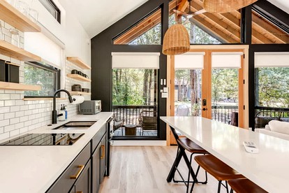 Tranquil Modern Cabin with Friendly Farm Animals & Pond Views Near Cedar Creek, Texas - Cedar Creek, Texas - glamping.directory