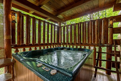 Cozy and Romantic Rental Cabin for Two with Private Hot Tub near Great Smoky Mountains in Gatlinburg, Tennessee - Gatlinburg, Tennessee - glamping.directory