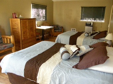 Suite Rental in Secluded Log Cabin Lodge on the Banks of Kootenai River, Northern Idaho - Bonners Ferry, Idaho - glamping.directory