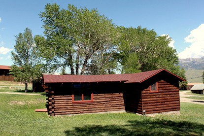 Rustic Log Cabin Rental for Six on the Shoshone River in Wyoming - glamping.directory