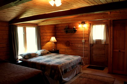 Rustic Log Cabin Rental for Six on the Shoshone River in Wyoming - Cody, Wyoming - glamping.directory