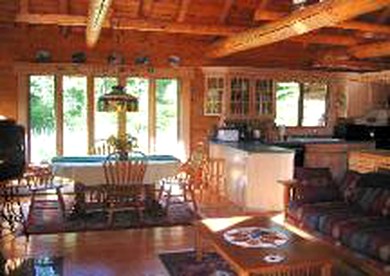 Rustic Log Cabins on Little Martha Lake, Wisconsin - Mercer, Wisconsin - glamping.directory