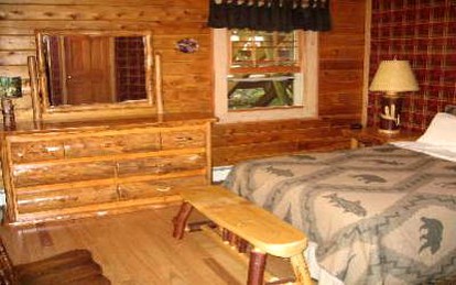 Rustic Log Cabins on Little Martha Lake, Wisconsin - Mercer, Wisconsin - glamping.directory