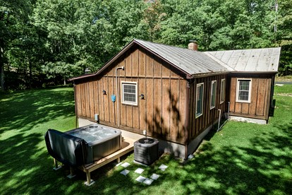 River Access Cabin with Hot Tub, Fire Pit and Plenty of Modern Touches - Minutes from Lost River at this Mathias, WV Getaway - glamping.directory