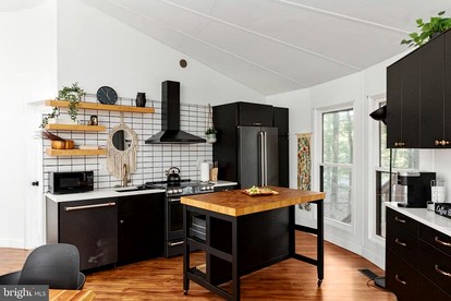 Modern Cabin with Hot Tub, Fire Pit and Grill in Hedgesville, WV - Hedgesville, West Virginia - glamping.directory