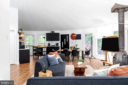 Modern Cabin with Hot Tub, Fire Pit and Grill in Hedgesville, WV - Hedgesville, West Virginia - glamping.directory