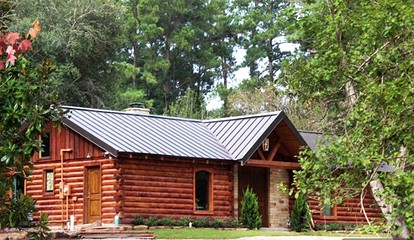 Rustic Lodge Getaway with Large Patio and Pond near Lufkin, Texas - Huntington, Texas - glamping.directory