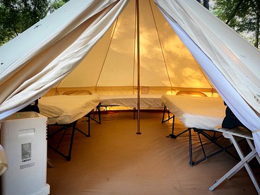 Relaxation and Fun Combined Glamping Tents M & In-Water Picnic Table L in Kingsbury, TX - Kingsbury, Texas - glamping.directory