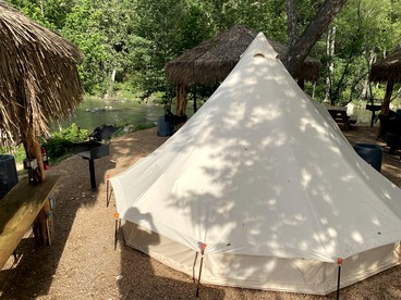 Relaxation and Fun Combined Glamping Tents M & In-Water Picnic Table L in Kingsbury, TX - Kingsbury, Texas - glamping.directory
