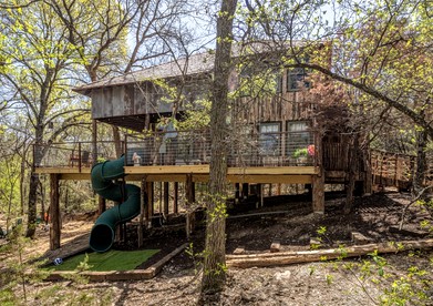 Magical Treehouse with Slide by Brazos River for Family Glamping Adventures in Texas - glamping.directory