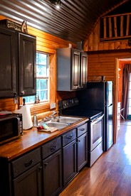 Vacation Cabin Rental with a Private Hot Tub near Fort Worth, Texas - Bluff Dale, Texas - glamping.directory
