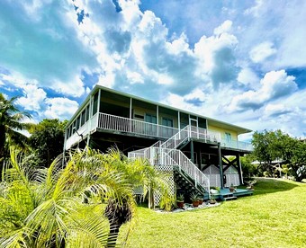 Spacious Family-Friendly Beach House with Dock Access near Little Gasparilla Island, Florida - glamping.directory