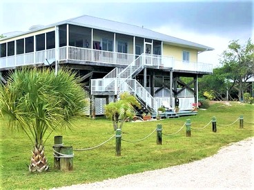 Spacious Family-Friendly Beach House with Dock Access near Little Gasparilla Island, Florida - Placida, Florida - glamping.directory