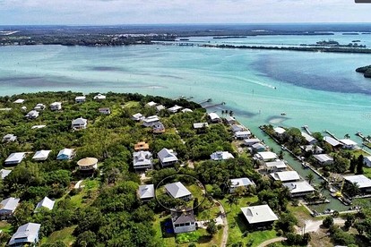 Spacious Family-Friendly Beach House with Dock Access near Little Gasparilla Island, Florida - Placida, Florida - glamping.directory