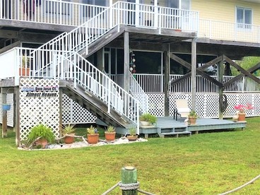 Spacious Family-Friendly Beach House with Dock Access near Little Gasparilla Island, Florida - Placida, Florida - glamping.directory