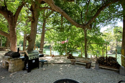 Stunning Riverfront Cottage with Amazing Outdoor Area Perfect for Water Activities in New Braunfels, Texas - New Braunfels, Texas - glamping.directory