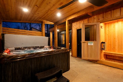 Spacious Modern Cabin with Basketball Court and Sauna in Broken Bow, Oklahoma - glamping.directory