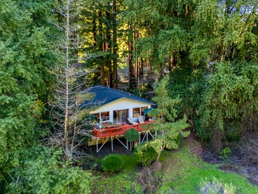 Peaceful Cottage with Deck and River Views in Monte Rio, California - glamping.directory