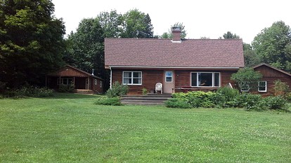 Rustic Camping Cabin with Fireplace in Private Woods near Bangor, Maine - glamping.directory