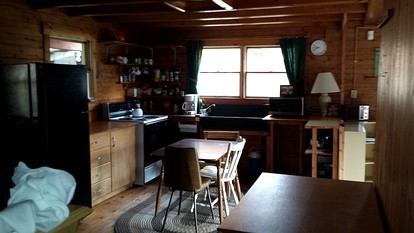 Rustic Camping Cabin with Fireplace in Private Woods near Bangor, Maine - Exeter, Maine - glamping.directory