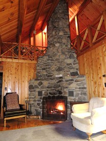 Rustic Camping Cabin with Fireplace in Private Woods near Bangor, Maine - Exeter, Maine - glamping.directory