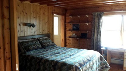 Rustic Camping Cabin with Fireplace in Private Woods near Bangor, Maine - Exeter, Maine - glamping.directory