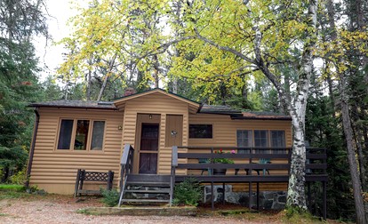 Secluded Creekside Cabin with Screened Porch Near the Marina in Babbitt, Minnesota - glamping.directory