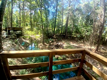 Tranquil Creekside Container with Private Waterfall Near Renaissance Festival | Magnolia, Texas - Grimes County, Texas - glamping.directory