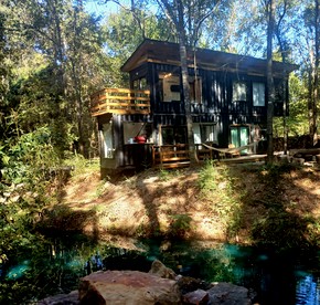 Tranquil Creekside Container with Private Waterfall Near Renaissance Festival | Magnolia, Texas - glamping.directory