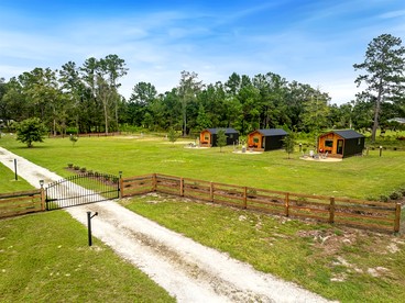 Entire Farm Retreat with Three Modern Cabins in Lake City, Florida, Perfect for an Event or Large Family Getaway - Lake City, Florida - glamping.directory