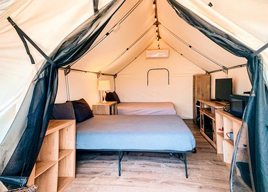 Wonderful Texas Glamping Getaway with Kayaks, Canoes and Paddleboards: Comfortable Safari Tent in on the Cibolo Creek in Marion - Marion, Texas - glamping.directory