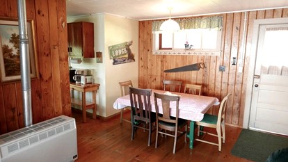 Serene Lakefront Cabin with Picture-Window Fishing Beside Covered Boathouse in Orr, Minnesota - Orr, Minnesota - glamping.directory