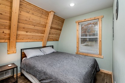 Lakefront A-Frame with Lofted Interior Ideal for Outdoor Activities in Michigan - Au Gres, Michigan - glamping.directory