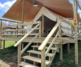 Cozy Tented Cabin with Fire Pit and Barbecue in Logan, Ohio - glamping.directory