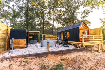 Secluded Tiny Home with Hot Tub, Sauna & Fire Pit near Lake Livingston in Coldspring, Texas - glamping.directory