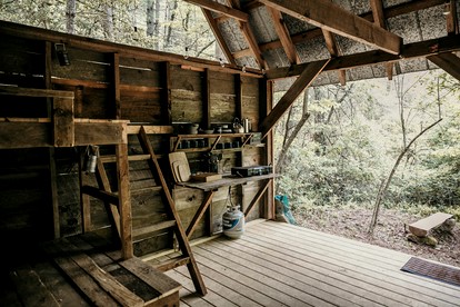 Secluded Woodland Cabin Near Waterfalls and Forest Trails in Zirconia, North Carolina - Zirconia, North Carolina - glamping.directory