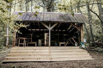 Secluded Woodland Cabin Near Waterfalls and Forest Trails in Zirconia, North Carolina - glamping.directory