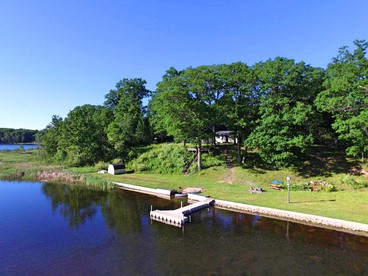 Secluded Lake Cottage Rental with a Dock and a Game Room in Hale, Michigan - Hale, Michigan - glamping.directory