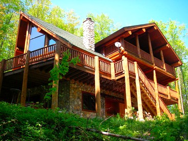 Gorgeous Log Cabin for Group Getaways to Shanty Creek Resort, Michigan - glamping.directory