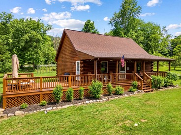 Charming Cabin Getaway with Loft Hangout & Outdoor Oasis in Cabins, West Virginia - glamping.directory