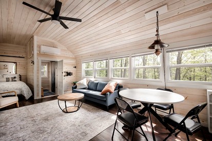 Modern Tiny Cabin with Game Room & Fire Pit in West Virginia - Great Cacapon, West Virginia - glamping.directory
