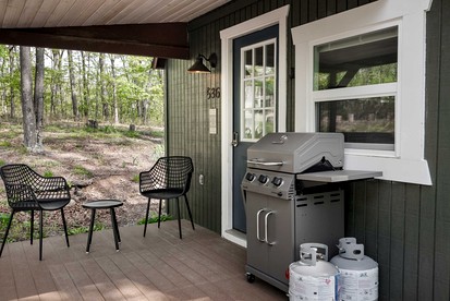 Modern Tiny Cabin with Game Room & Fire Pit in West Virginia - Great Cacapon, West Virginia - glamping.directory