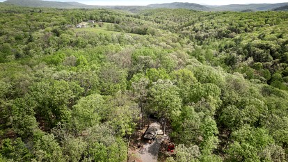 Modern Tiny Cabin with Game Room & Fire Pit in West Virginia - Great Cacapon, West Virginia - glamping.directory