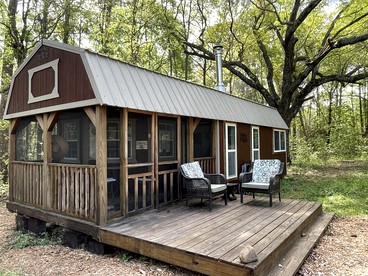 Serene Forest Cabin with Hammock, Loft & Reading Nook in La Grange, Georgia - glamping.directory
