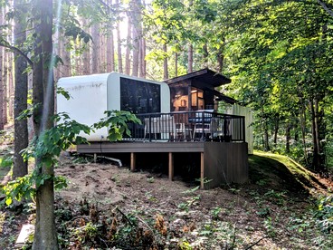 Secluded Modern Tiny House with Wood-Fired Hot Tub Near Trails in Sears, Michigan - glamping.directory