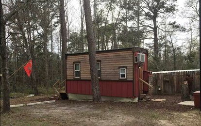 Off-Grid Tiny House Surrounded by Trees in Ravenel, South Carolina - glamping.directory