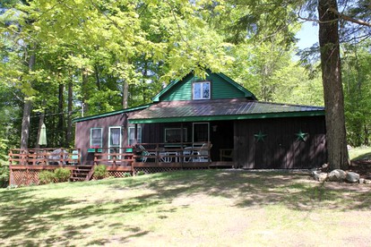 Charming Cabin Rental with Private Beach Access on Lake George in New York - glamping.directory